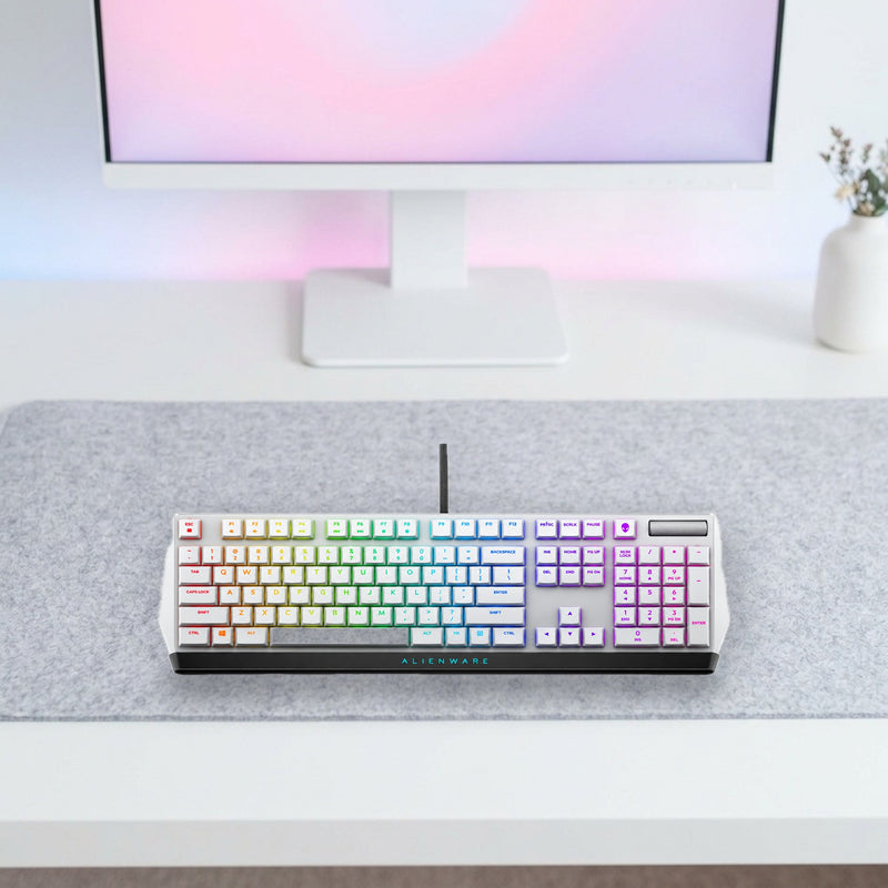 Lifestyle: Dell Alienware AW510K Low-Profile RGB Mechanical Gaming Keyboard – Cherry MX Red, US International QWERTY shown on a styled desk (actual product photo, room is illustrative)