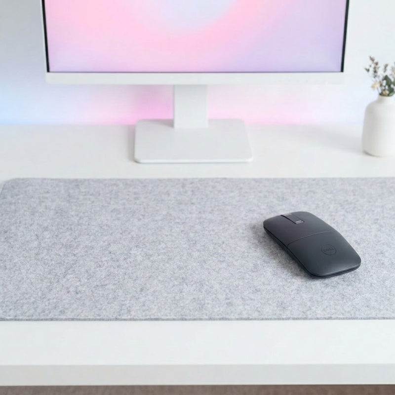 Lifestyle: DELL BLUETOOTH TRAVEL MOUSE - MS700 on a desk (illustrative image; the first photo shows the actual product)
