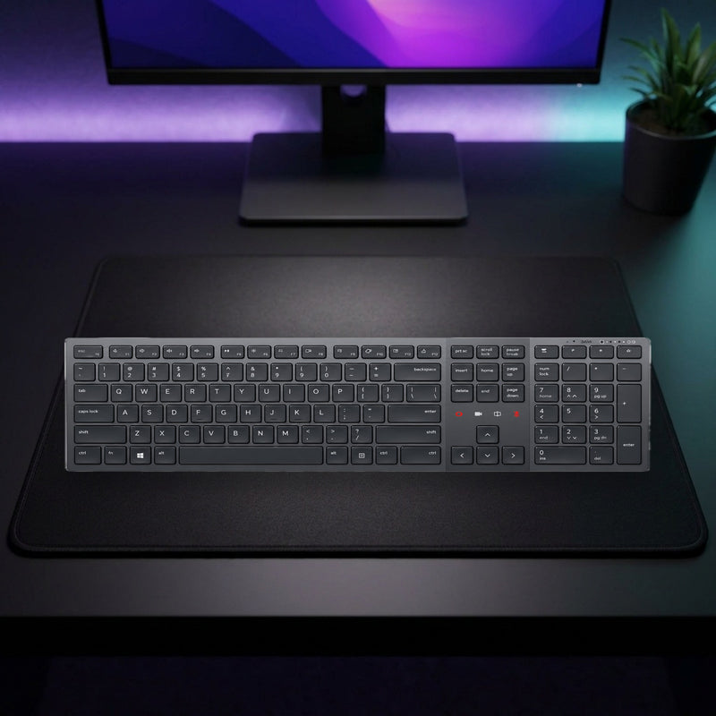 Lifestyle: Dell Premier Collaboration Keyboard KB900 – US International QWERTY, Wireless shown on a styled desk (actual product photo, room is illustrative)