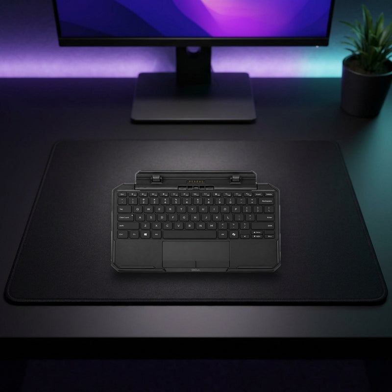 Lifestyle: Dell Pro Rugged 10 Tablet Keyboard RE1026K – Backlit Docking Keyboard with Touchpad shown on a styled desk (actual product photo, room is illustrative)