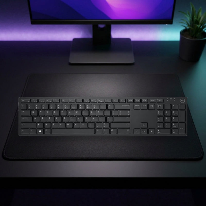 Lifestyle: Dell Wireless Keyboard KB500 – US International QWERTY shown on a styled desk (actual product photo, room is illustrative)