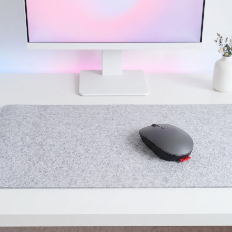 Lifestyle: LENOVO GO USB-C WIRELESS MOUSE on a desk (illustrative image; the first photo shows the actual product)