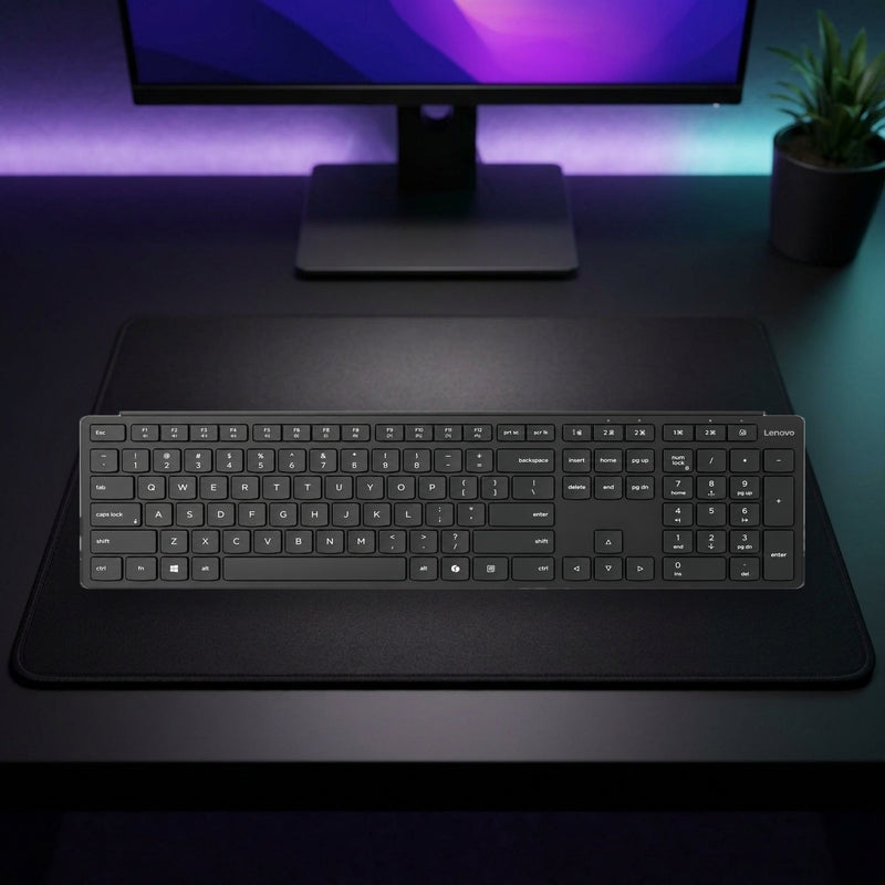 Lifestyle: Lenovo Wireless Multi-Mode Pro Keyboard 6000 – Bluetooth & 2.4GHz Wireless shown on a styled desk (actual product photo, room is illustrative)