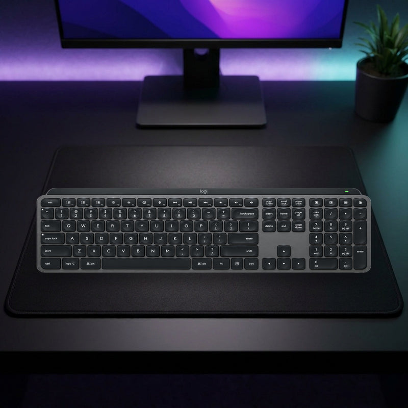 Lifestyle: Logitech MX Keys S Advanced Wireless Illuminated Keyboard – US International QWERTY, Graphite shown on a styled desk (actual product photo, room is illustrative)