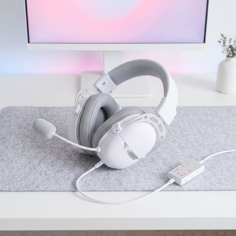Lifestyle: Redragon H376 Aurora USB Gaming Headset | Virtual 7.1 Surround | 40mm Drivers | 3 EQ Modes | PC, PS5, Switch | White on a desk (illustrative image; the first photo shows the actual product)