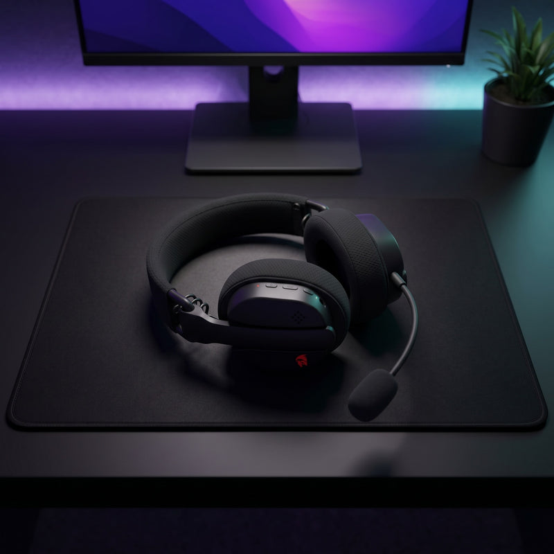 Lifestyle: Redragon H888 Luce Wireless Gaming Headset | 7.1 Surround | 2.4GHz + Bluetooth 5.3 + 3.5mm | 25-Hour Battery | Black on a desk (illustrative image; the first photo shows the actual product)