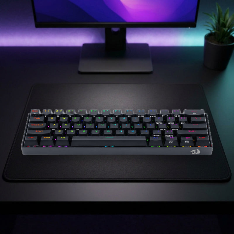 Lifestyle: Redragon K530 Pro Draconic 60% RGB Wireless Mechanical Gaming Keyboard | Tri-Mode | Hot-Swappable Red Switches | 61 Keys | Black shown on a styled desk (actual product photo, room is illustrative)