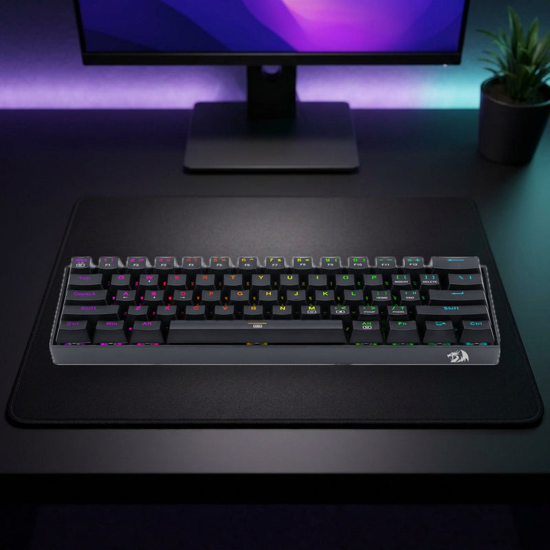 Lifestyle: Redragon K630 Dragonborn 60% RGB Mechanical Gaming Keyboard | Red Switches | 61 Keys | Detachable USB-C | Black shown on a styled desk (actual product photo, room is illustrative)