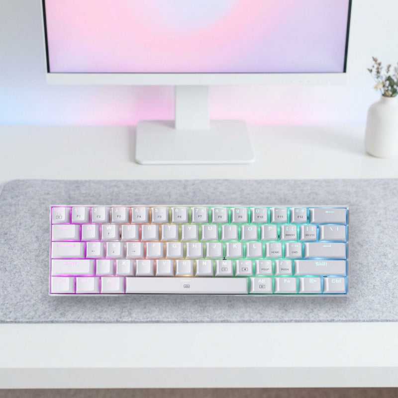 Lifestyle: Redragon K630 Dragonborn 60% RGB Mechanical Gaming Keyboard | Red Switches | 61 Keys | Detachable USB-C | White shown on a styled desk (actual product photo, room is illustrative)