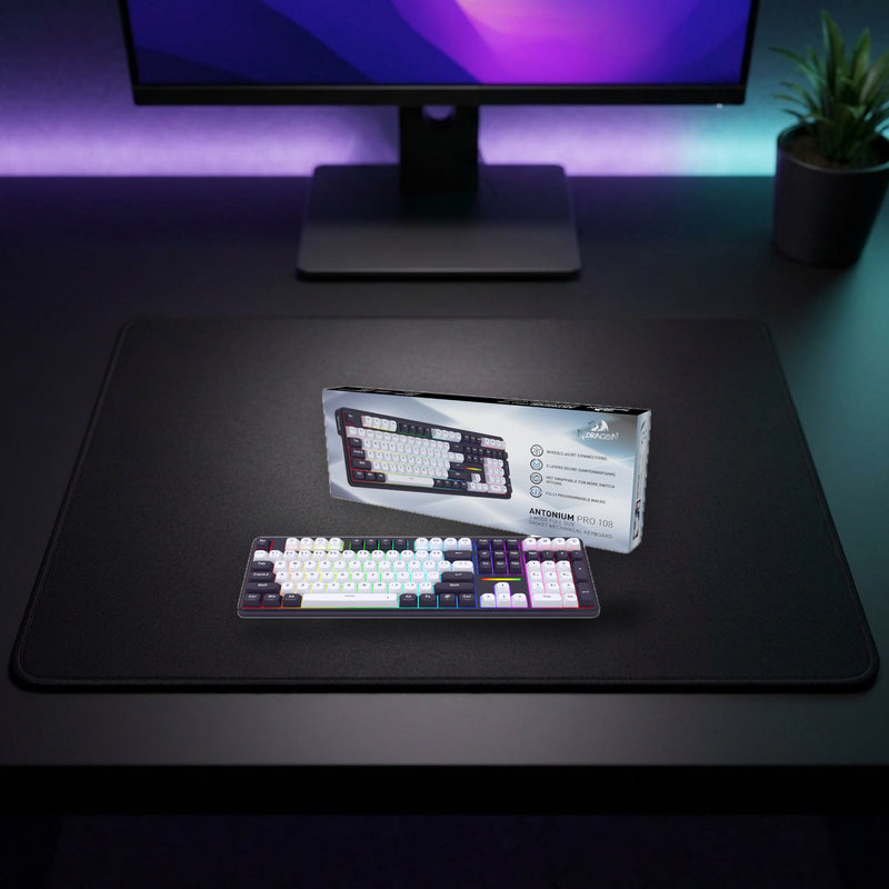 Lifestyle: Redragon K745 Pro Antonium RGB Wireless Mechanical Gaming Keyboard | Full-Size 108 Keys | Gasket Mount | Tri-Mode | Hot-Swappable shown on a styled desk (actual product photo, room is illustrative)