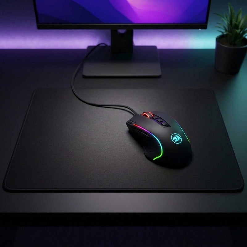 Lifestyle: Redragon M612 Predator RGB Wired Gaming Mouse | 4000 DPI, 11 Programmable Buttons, Black on a desk (illustrative image; the first photo shows the actual product)