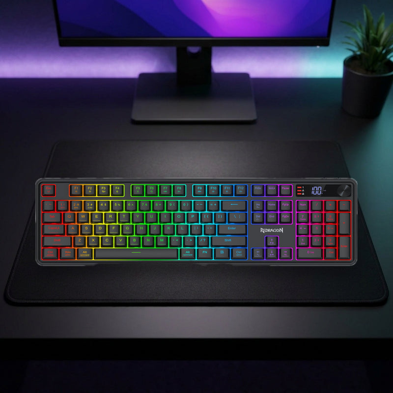 Lifestyle: Redragon RM104 Pro Volcano RGB Wireless Membrane Gaming Keyboard | Tri-Mode | 4000mAh Battery | Control Knob | Full-Size | Black shown on a styled desk (actual product photo, room is illustrative)