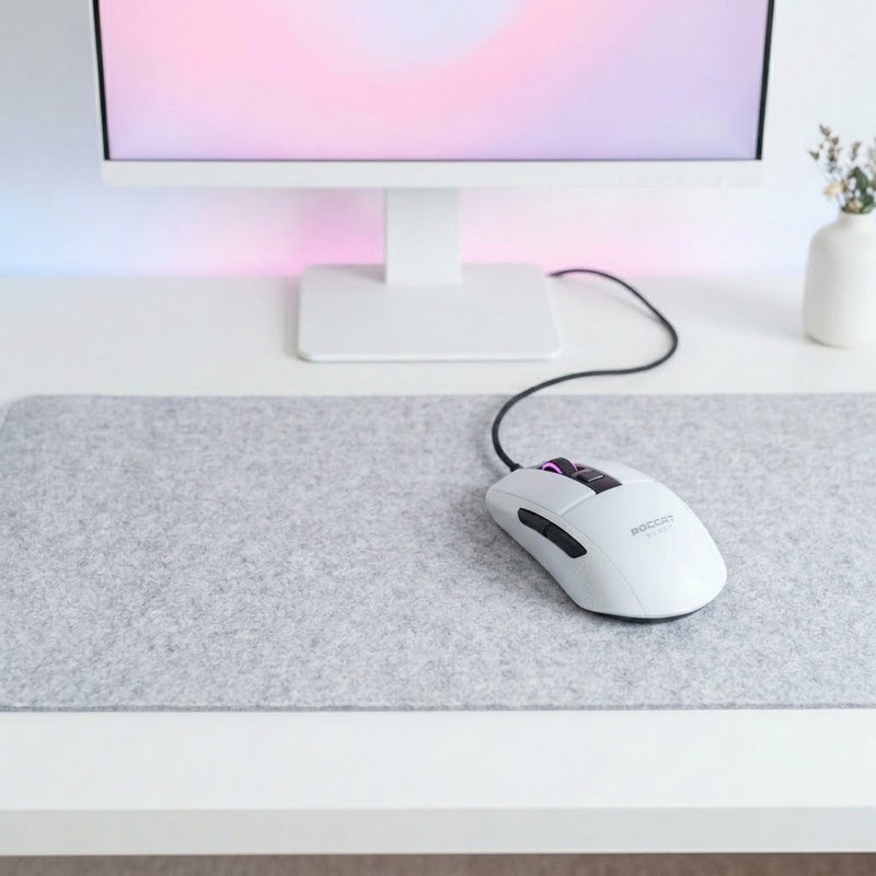 Lifestyle: Roccat Burst Core Lightweight Gaming Mouse - White on a desk (illustrative image; the first photo shows the actual product)