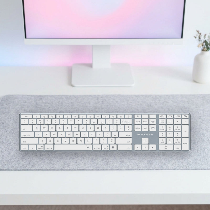 Lifestyle: Targus HyperSpace Full-Size Bluetooth 5.0 Wireless Backlit Keyboard – UK Layout shown on a styled desk (actual product photo, room is illustrative)